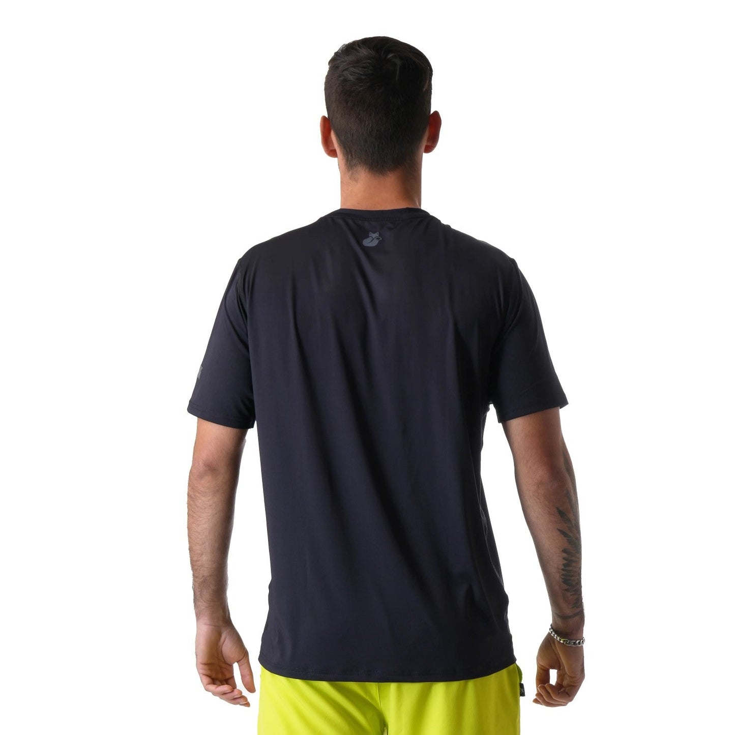 Polera deportiva Poly Tilki Temel Negra Talla XS